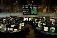 Oro in discesa: il prezzo spot scivola a 4.990 dollari